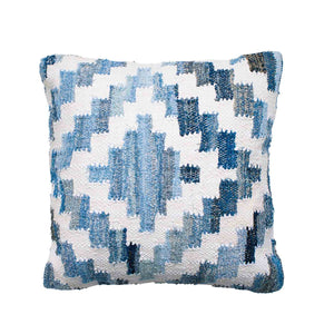 Coastal style denim blue and white square cushion in Aztec pattern.