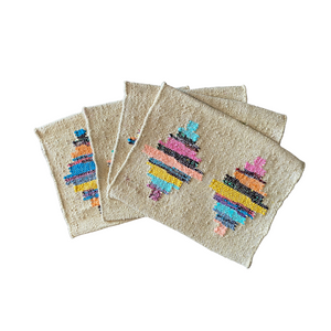Amaya Handwoven Placemats - Set of 4. Muliti coloured Aztec pattern on a jute border.