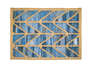 Coastal style upcycled denim blue and sustainable dark jute door mat in Herringbone pattern.