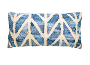 Coastal style denim blue and sustainable jute rectangle cushion in herringbone pattern.