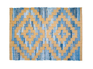 Coastal style upcycled denim blue and sustainable dark jute door mat in Aztec pattern.