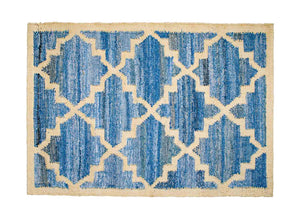 Hamptons style upcycled denim blue and sustainable jute door mat in lattice pattern.